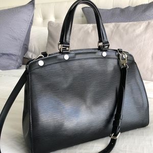 SOLD Auth Louis Vuitton Brea in Black Epi Leather